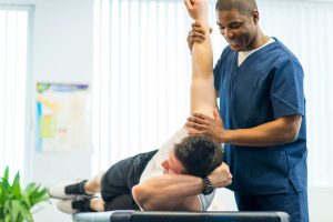 Physical Therapist Working with Client